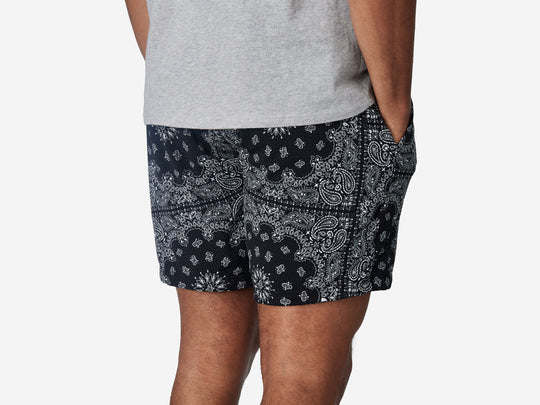 6" Bandana Pocket Lounge Shorts on model back side view.
