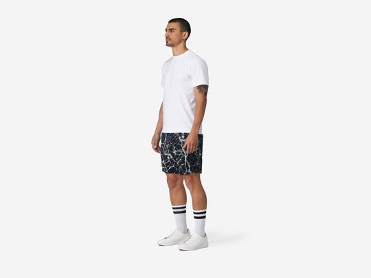 6" Marble Pocket Lounge Short on model full body side.