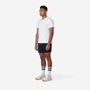 Side view of mean wearing black lounge short.