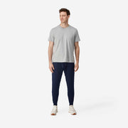 Fully body front view of man wearing navy blue lounge pant. 