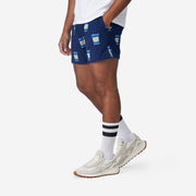4" Morning Joe Pocket Lounge Shorts on model side view.