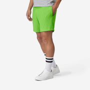 4" Melon Pocket Lounge Short on model side view.