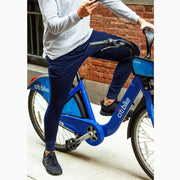 Man on bike wearing lounge pant.