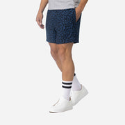4" Midnight Leopard Pocket Lounge Short on model side view with grey background.