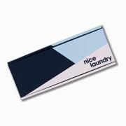 Monogram gift box in navy, light blue, white design.