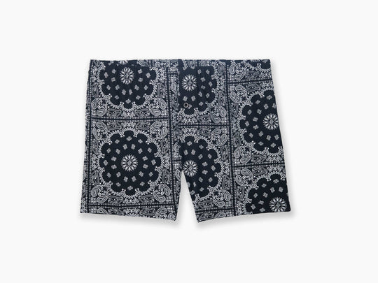 Black bandana printed on slim fit boxer laid flat against gray background.