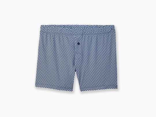 Blue herringbone pattern on slim fit boxer laid flat on grey background.