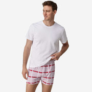Full body front view of man wearing red & white printed "thank you" slim fit boxers & white t-shirt.