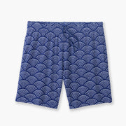 Blue lounge shorts with sunrise pattern laid flat on background.